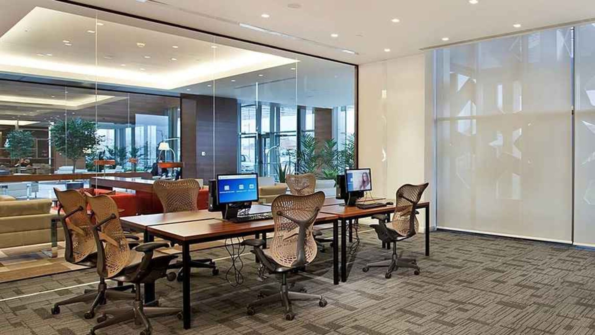 dedicated business center with business desk, chairs, PCs, and internet at Hilton Garden Inn Konya, Turkey.