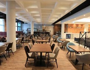 Dining area perfect for co-working at the Hampton by Hilton Gdansk Old Town.