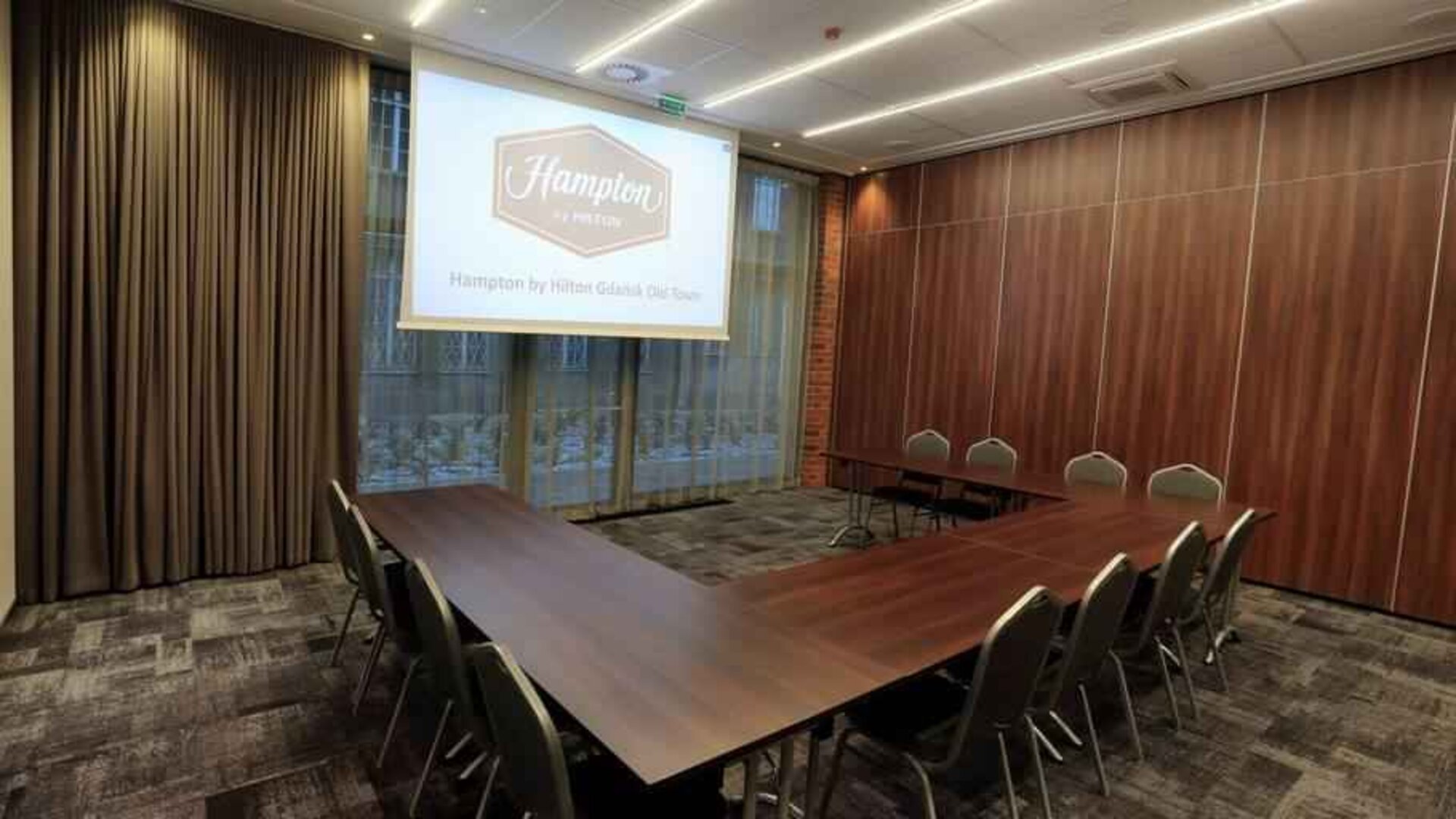 Meeting room with u shape table at the Hampton by Hilton Gdansk Old Town.