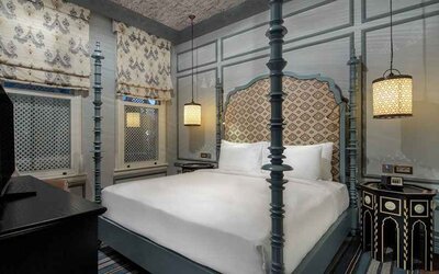 lovely delux king bedroom with TV at Hagia Sofia Mansions Istanbul, Curio Collection by Hilton.