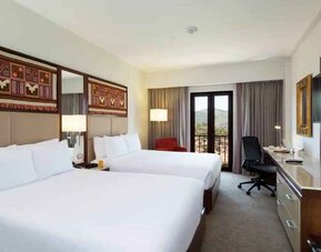 Twin room with desk at the Hilton Garden Inn Cusco, Peru.