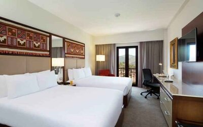 Twin room with desk at the Hilton Garden Inn Cusco, Peru.