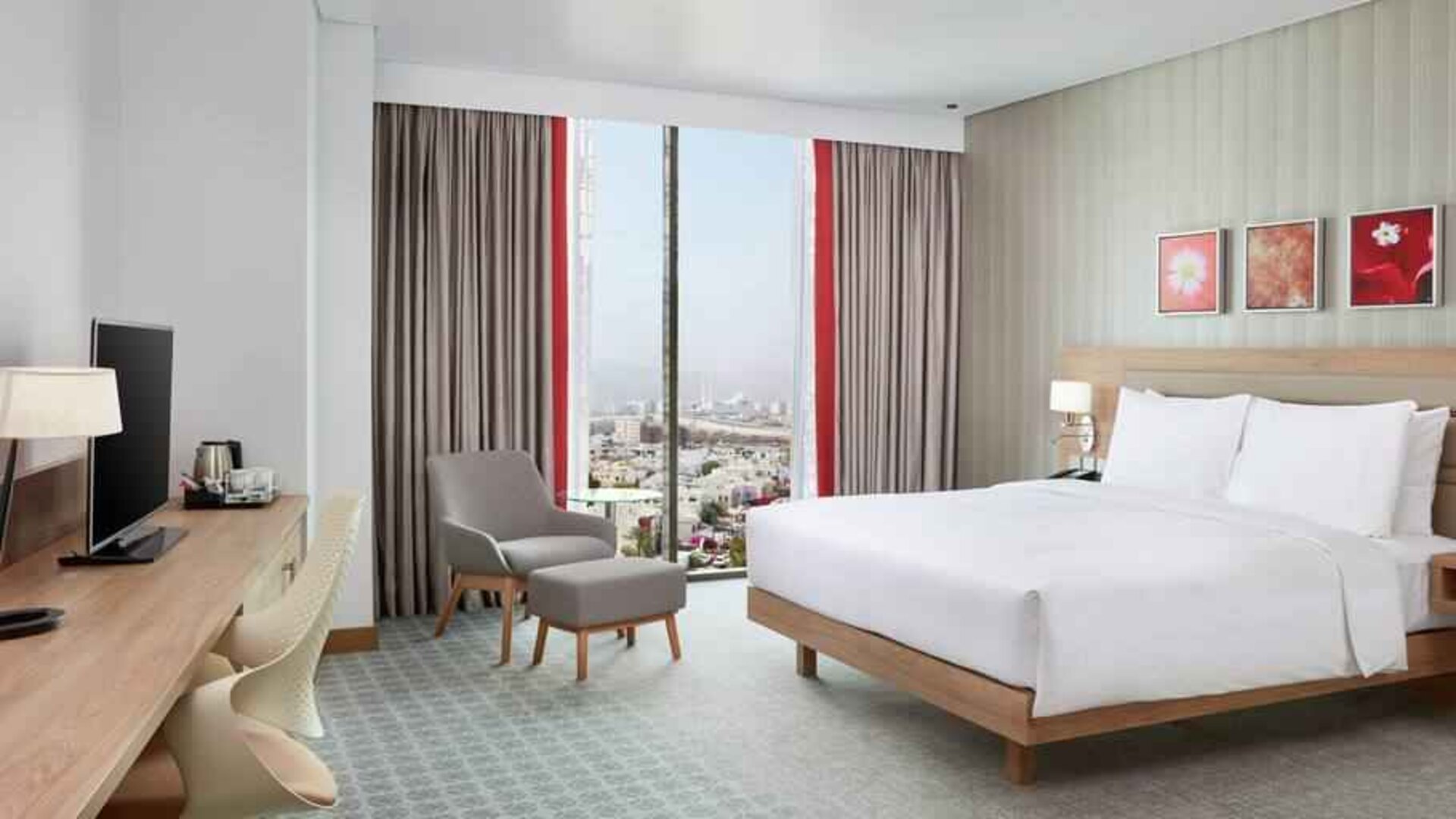 King superior room with desk at the Hilton Garden Inn Muscat Al Khuwair.