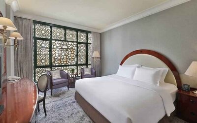 King bedroom with desk at the Madinah Hilton Hotel.