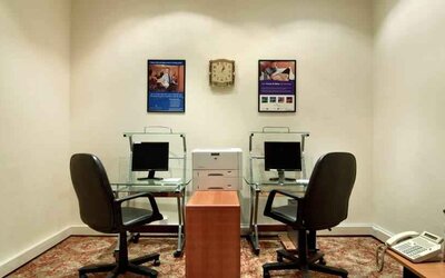 Business center with computers and printer at the Madinah Hilton Hotel.