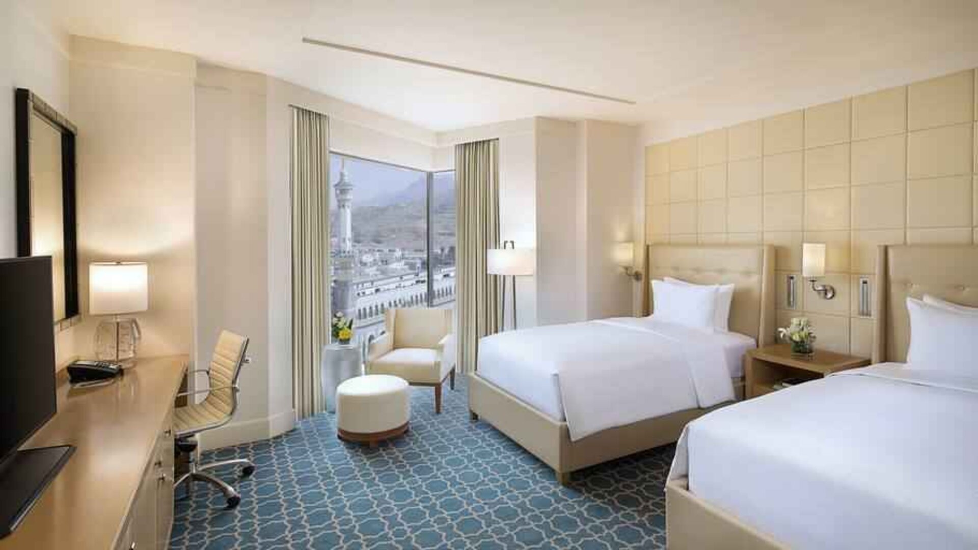 Twin room with desk at the Hilton Makkah Convention Hotel.