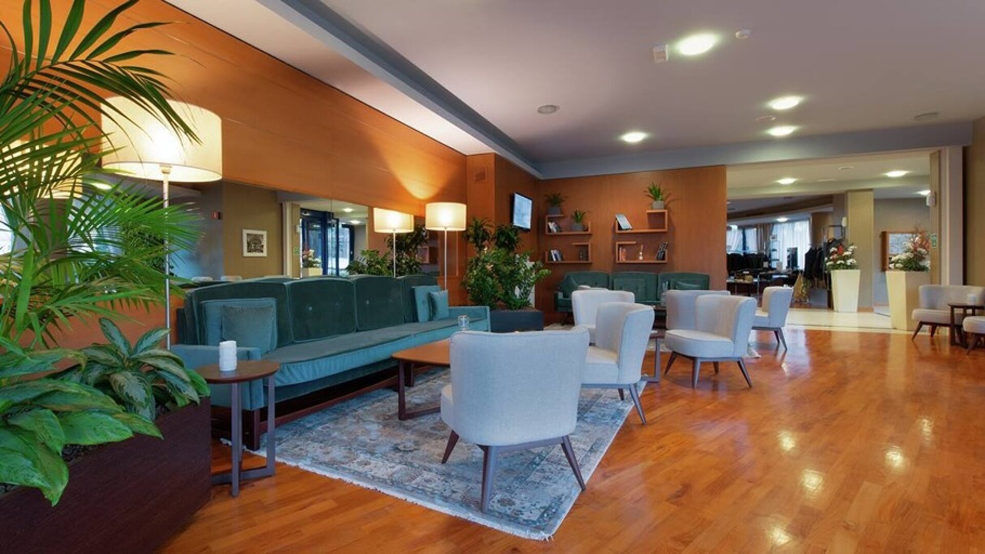 comfortable and spacious lobby and coworking space at Hilton Garden Inn Milan Malpensa.