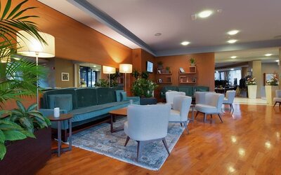 comfortable and spacious lobby and coworking space at Hilton Garden Inn Milan Malpensa.