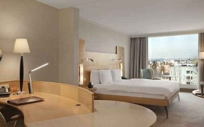 Spacious hotel room with working station at the Hilton Zurich Airport.