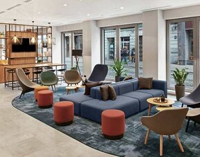 comfortable and spacious lobby and coworking space at Hilton Garden Inn Riga Old Town.