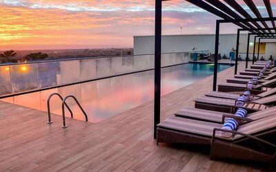 lovely outdoor pool with sun beds at Hilton Garden Inn Nairobi Airport.