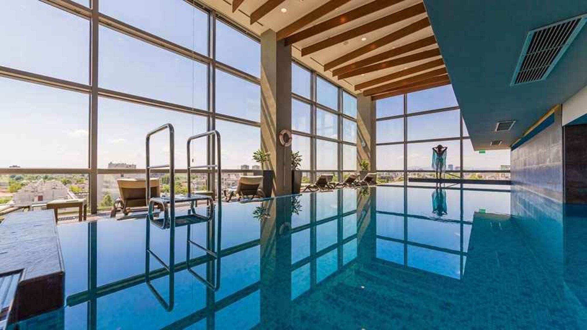 stunning indoor pool with sunbeds at DoubleTree by Hilton Zagreb.