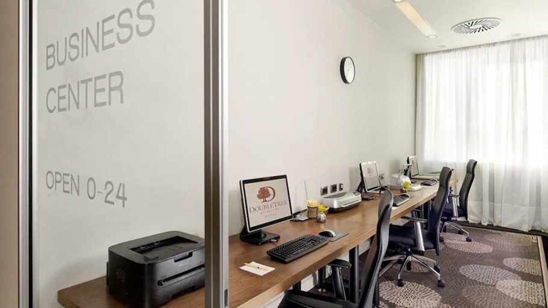 dedicated business center with PC, internet, printer, and workspace at DoubleTree by Hilton Zagreb.