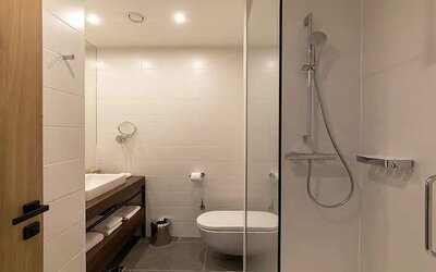 clean and spacious king bathroom with shower at Hilton Garden Inn Zagreb - Radnicka.