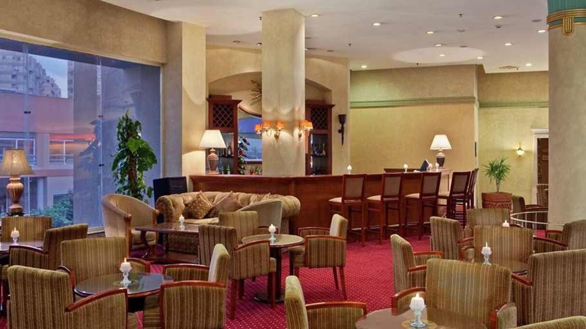 spacious lobby and coworking space at Hilton Alexandria Green Plaza.