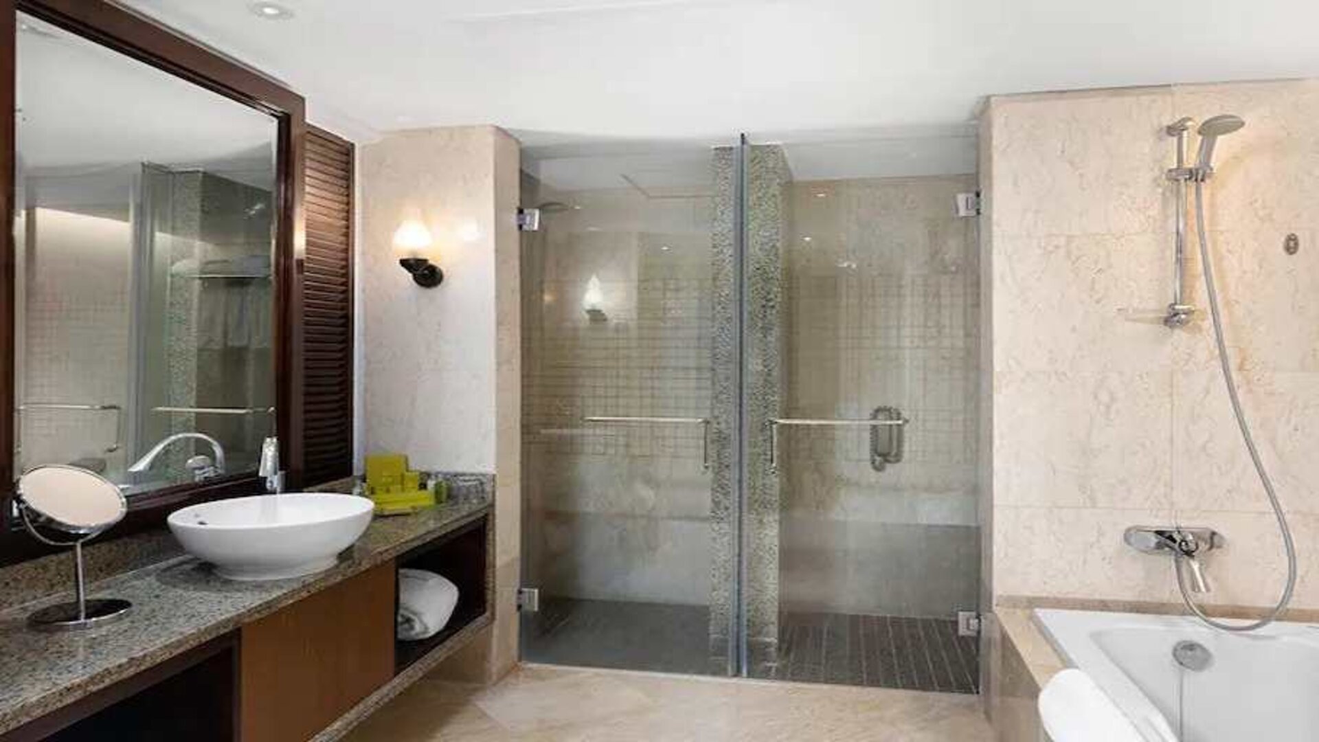 clean and spacious king bathroom with shower and bath at Hilton Luxor Resort & Spa.