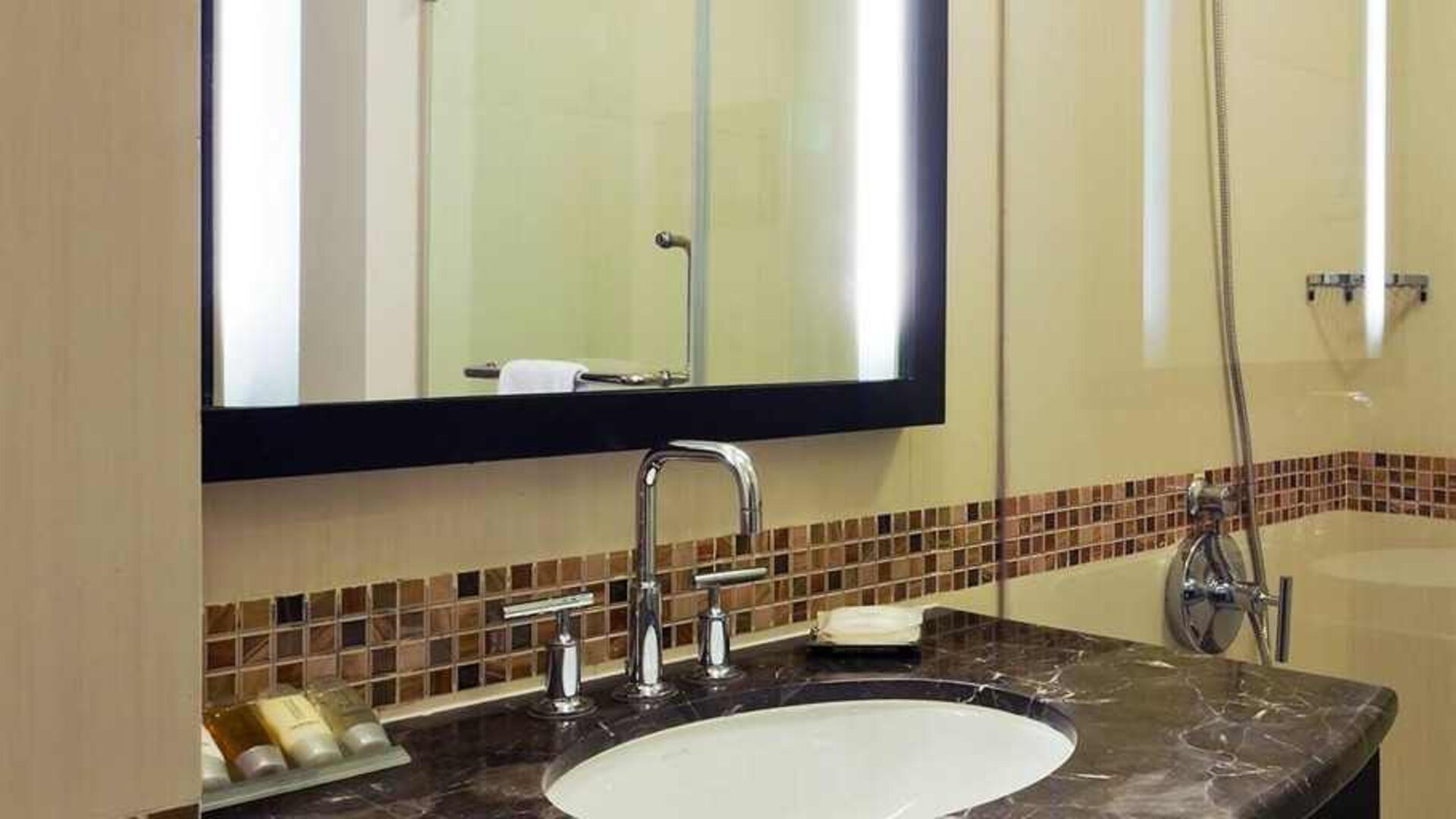 clean and spacious bathroom with shower at Hampton by Hilton Vadodara-Alkapuri.