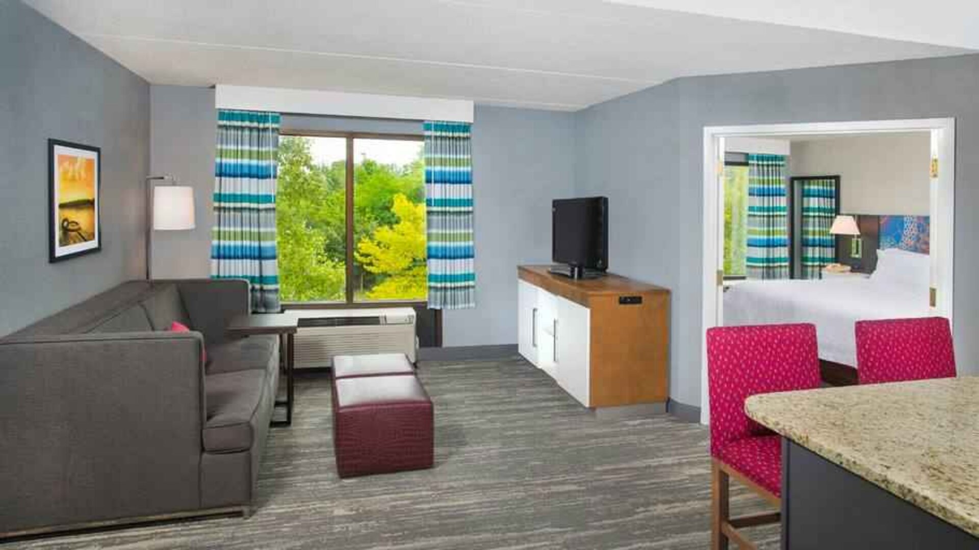 Living room perfect as workspace at Hampton Inn & Suites Annapolis.