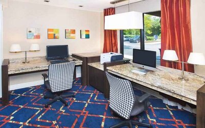 dedicated business center equipped with PCs, internet, printers, and work desk ideal for working remotely at Hampton Inn & Suites Annapolis.