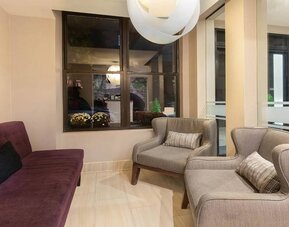 Lobby area at La Quinta Inn & Suites By Wyndham New York City Central Park.