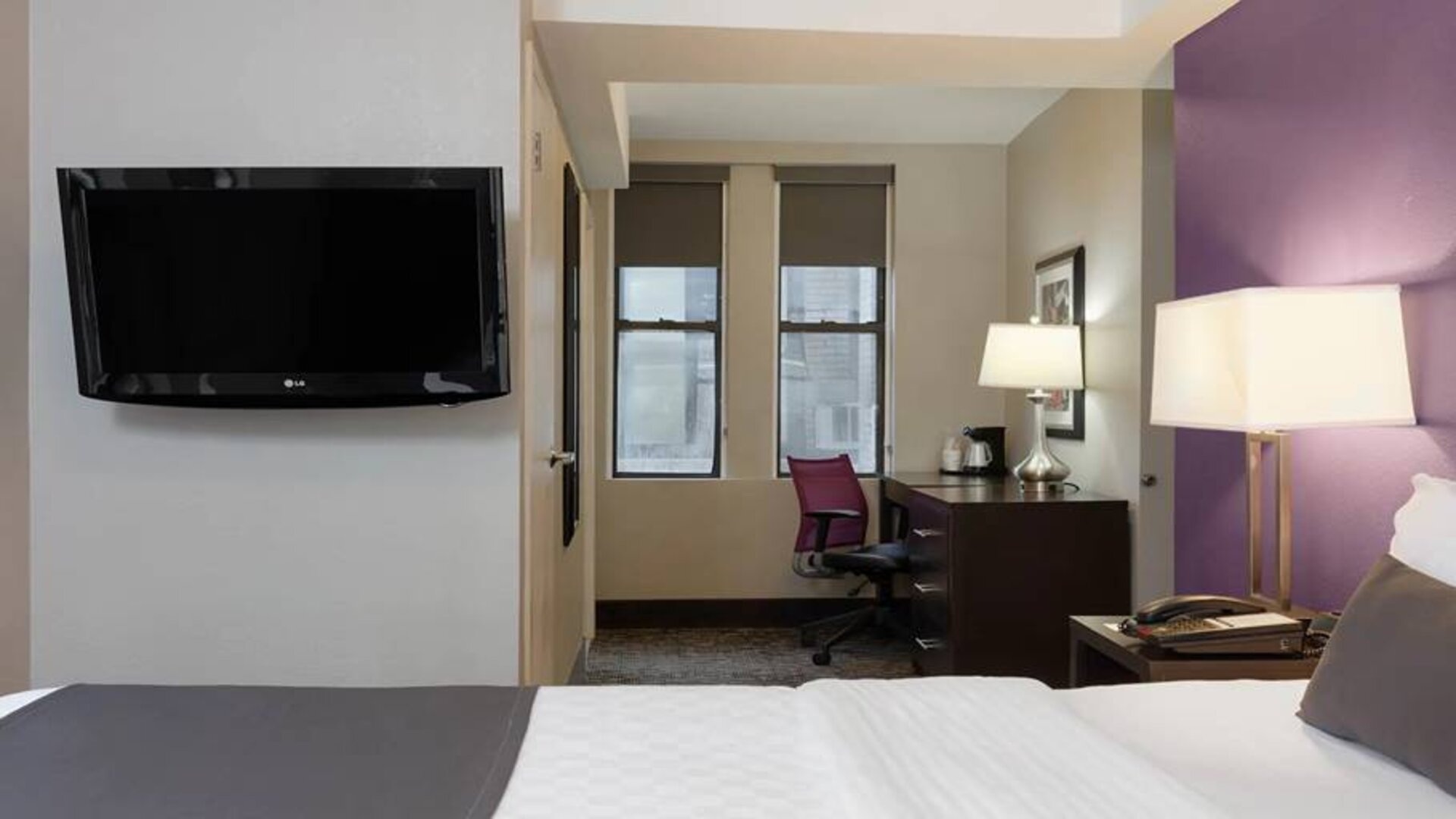 Day use room with work desk at La Quinta Inn & Suites By Wyndham New York City Central Park.