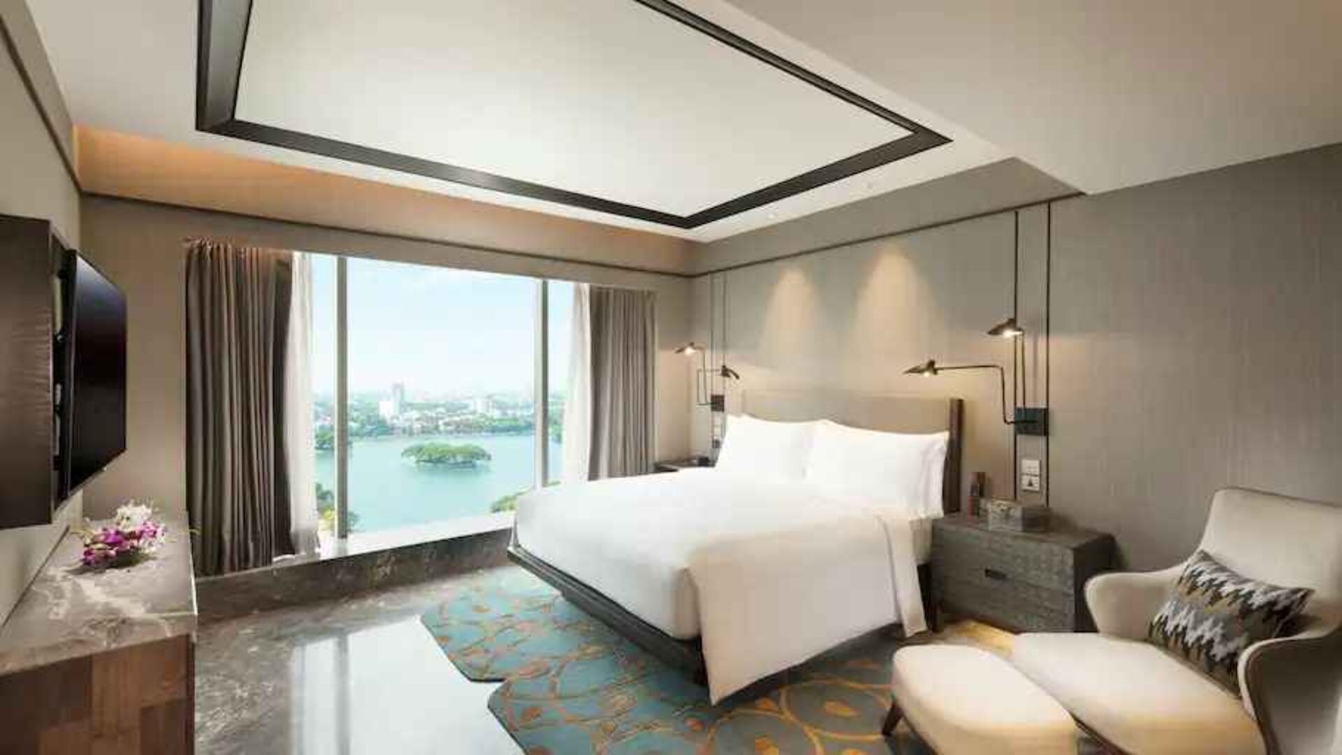 Comfortable king bedroom at the Conrad Bengaluru.