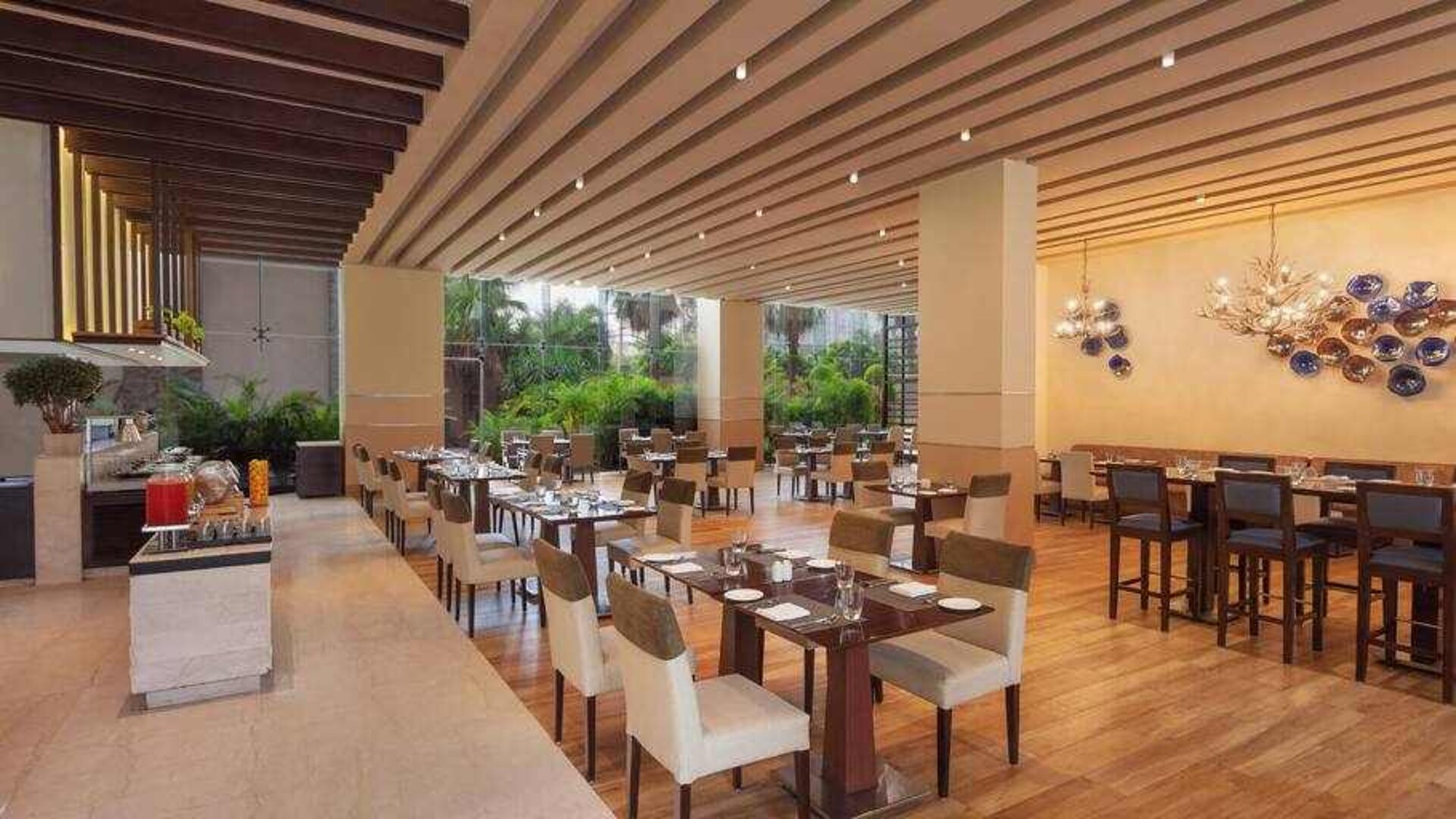 Dining area suitable for co-working at the DoubleTree by Hilton Gurugram Baani Square.