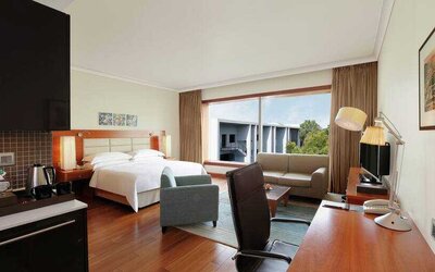 Spacious hotel room with working station at the Hilton Bangalore Embassy GolfLinks.