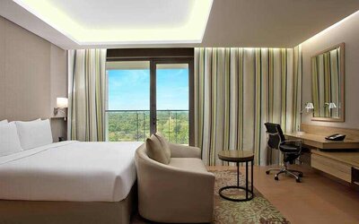 Comfortable hotel room at the DoubleTree Suites by Hilton Bangalore.