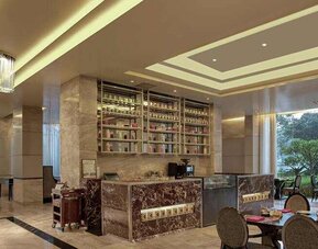 Hotel workspace at the DoubleTree Suites by Hilton Bangalore.