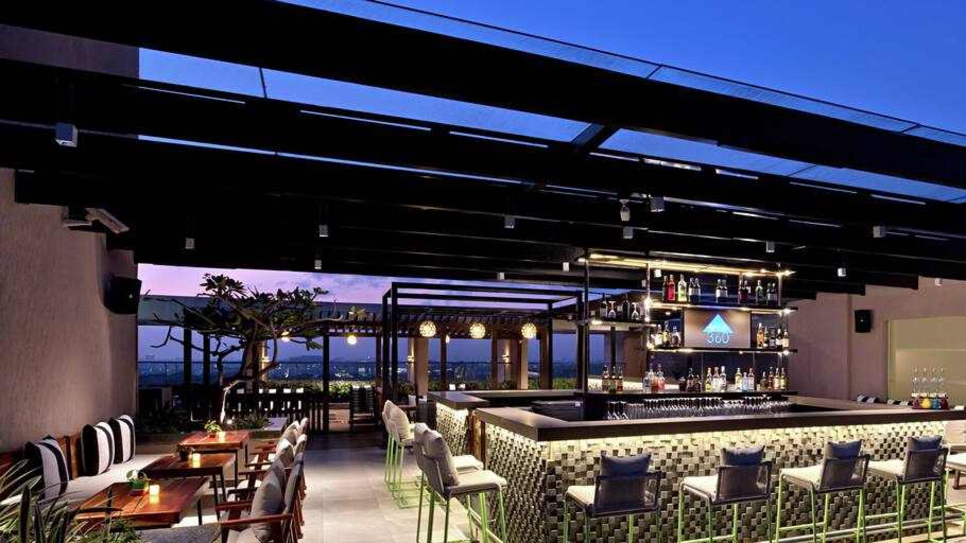 Outdoor patio perfect as workspace at the DoubleTree Suites by Hilton Bangalore.