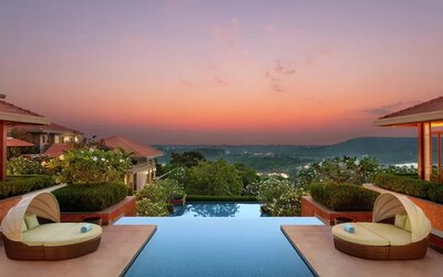 Outdoor pool area at the Hilton Goa Resort.