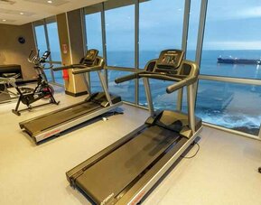 Fitness center at the Hampton by Hilton Antofagasta.