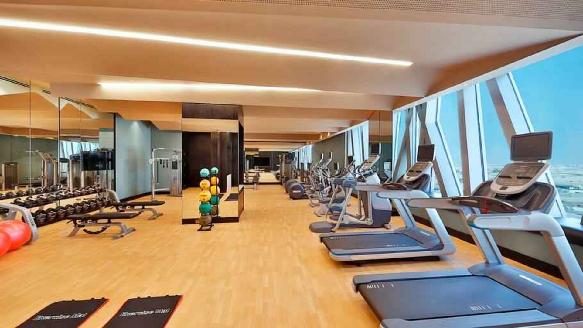 Fitness center at the AlRayyan Hotel Doha, Curio Collection by Hilton.