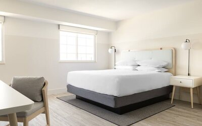 Hotel room with desk at the Hampton By Hilton Grand Cayman.