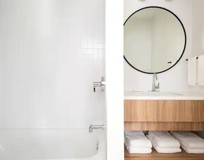 Guest bathroom at the Hampton By Hilton Grand Cayman.