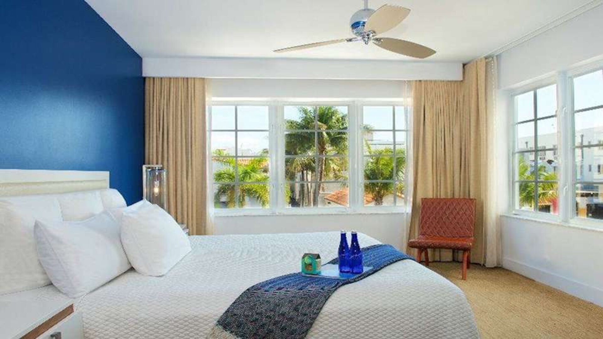 King bedroom with window at Blue Moon Hotel.