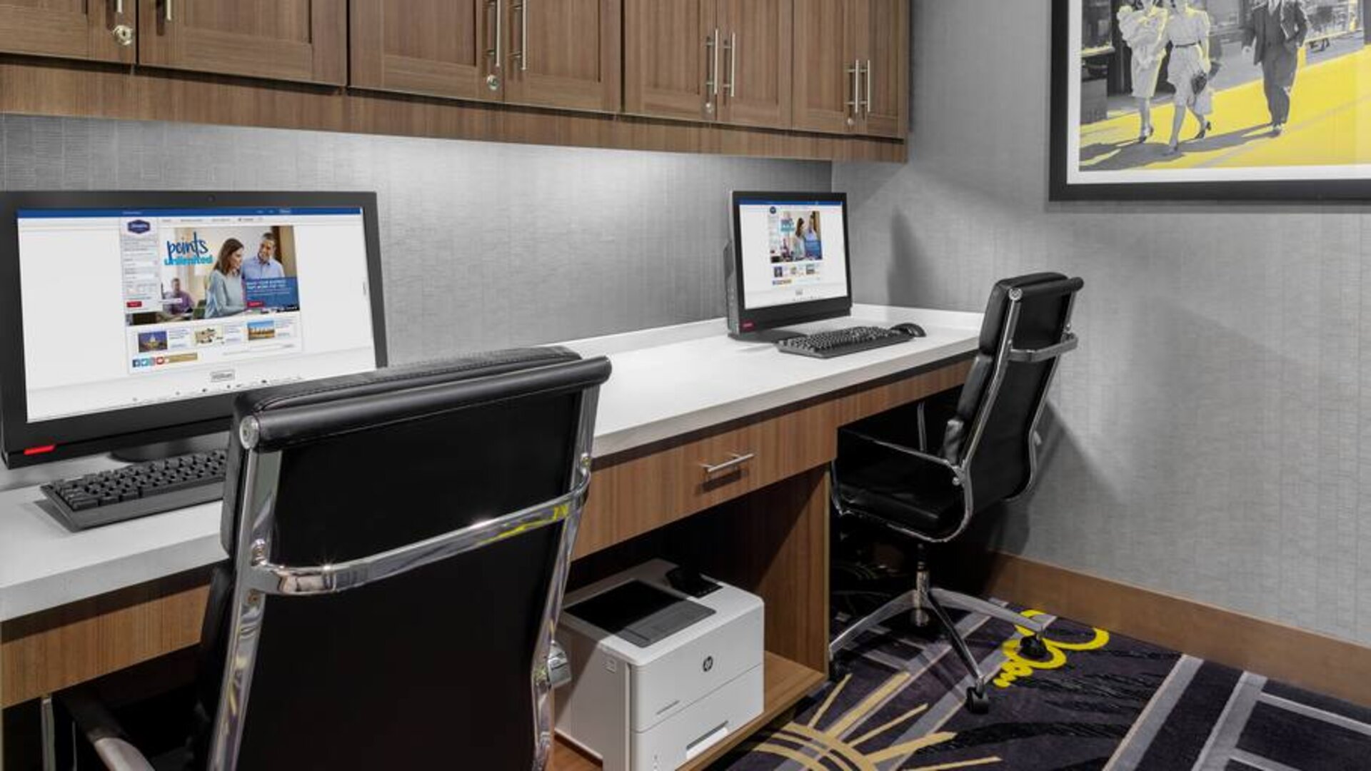 Business center with computers at Hampton Inn & Suites Los Angeles/ Hollywood.