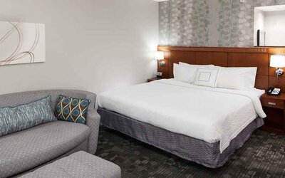 Day use room with sofa at Courtyard Miami Dolphin Mall.