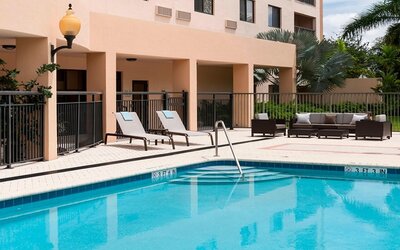 Refreshing outdoor pool at Courtyard Miami Dolphin Mall.