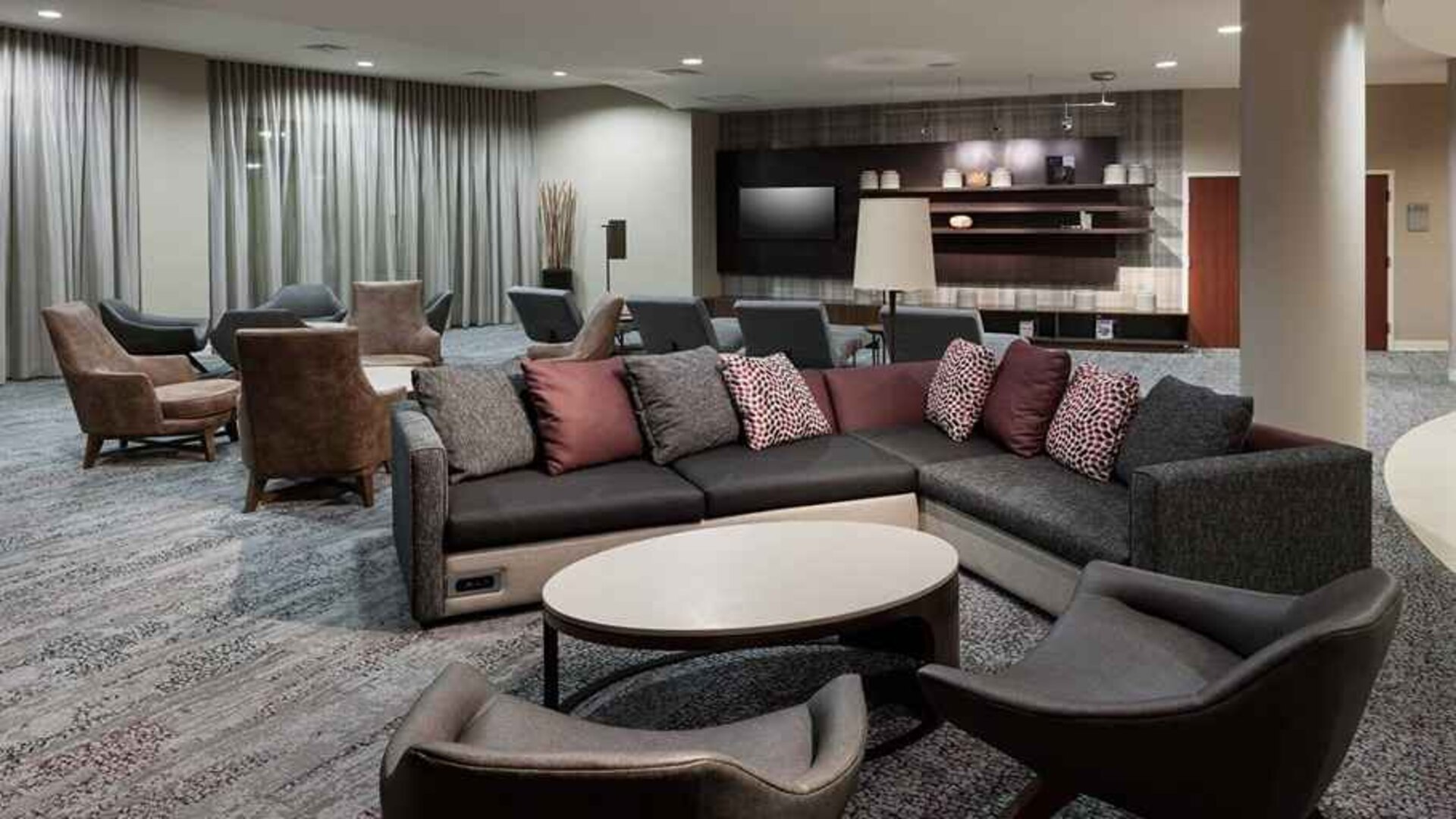 Lobby and coworking lounge at Courtyard Miami Dolphin Mall.