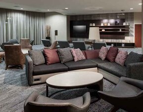 Lobby and coworking lounge at Courtyard Miami Dolphin Mall.