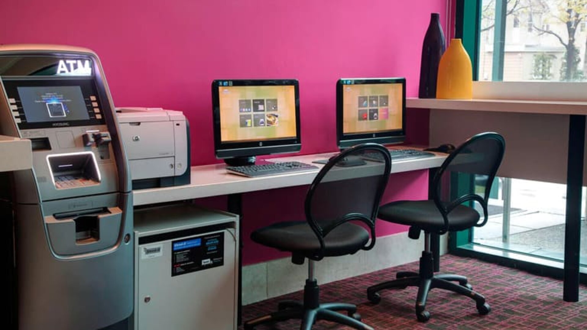 Well equipped business center with PC, internet, and printer at Courtyard By Marriott New York JFK Airport.