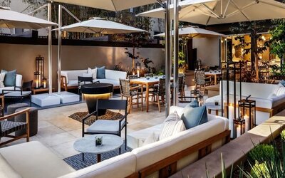 Comfortable lounge and coworking space at The Ambrose Hotel Santa Monica.