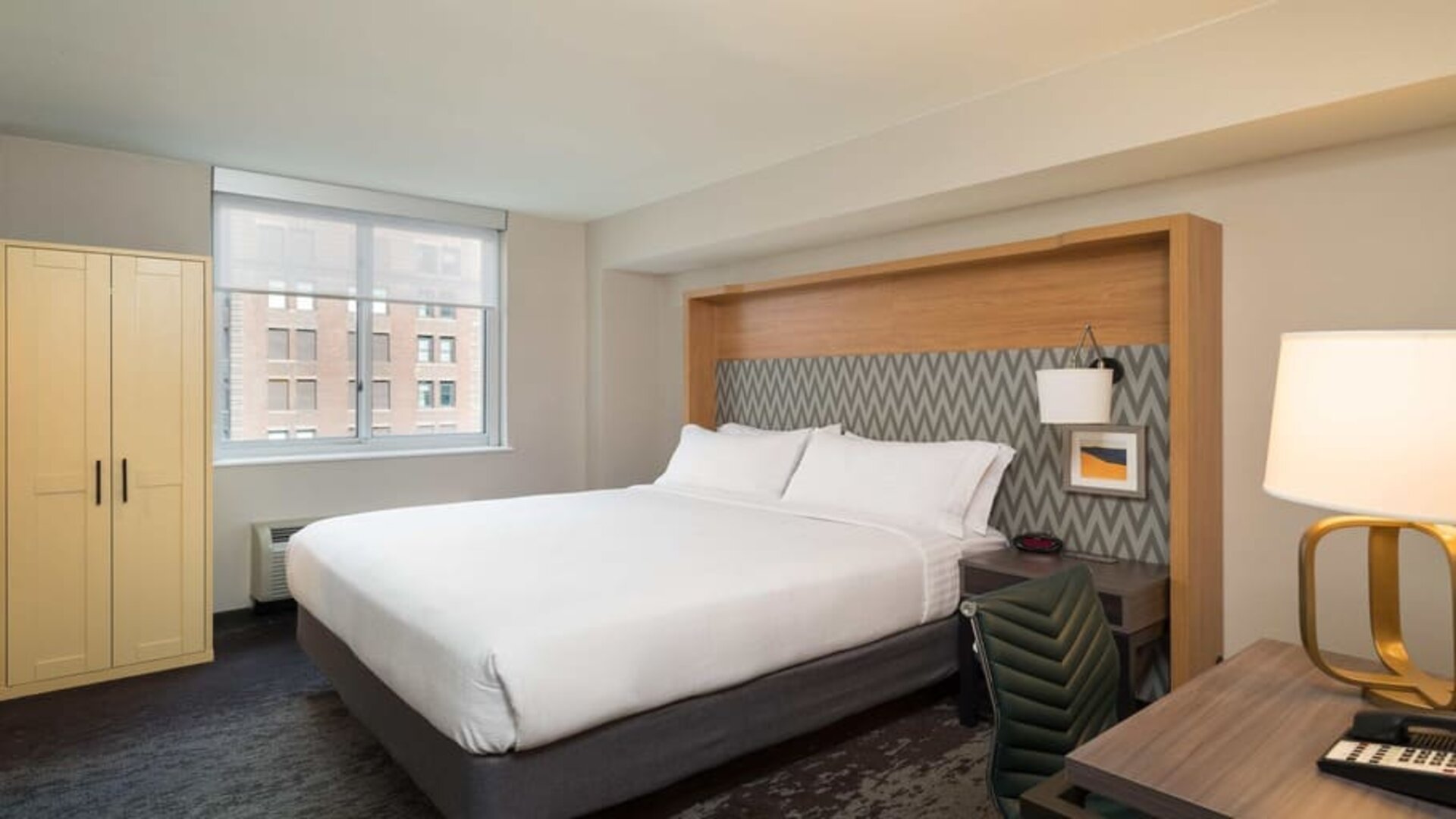 Comfortable delux king room with work station at Holiday Inn Wall Street.