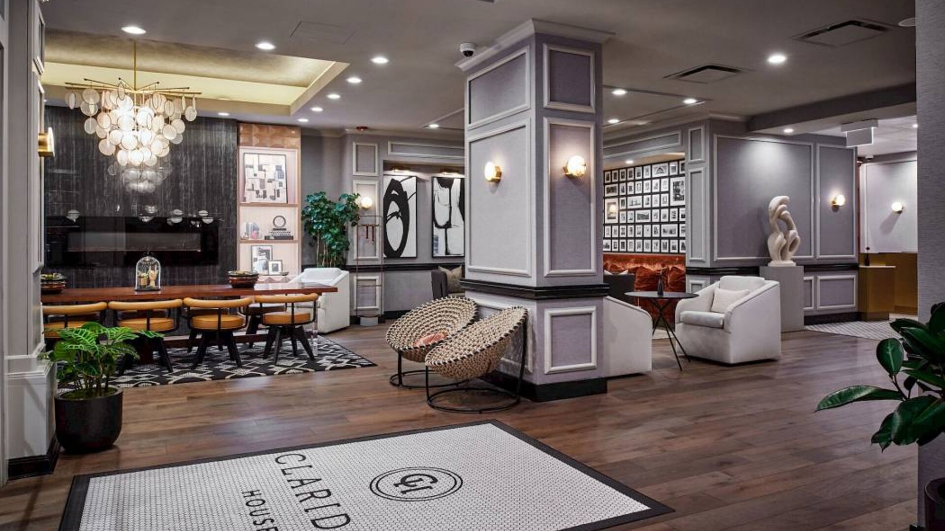 The lounge in Claridge House’s lobby, with numerous artworks in addition to comfortable seating and tables.