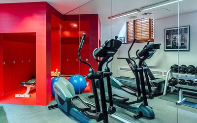 The hotel fitness center has both weights and exercise machines.