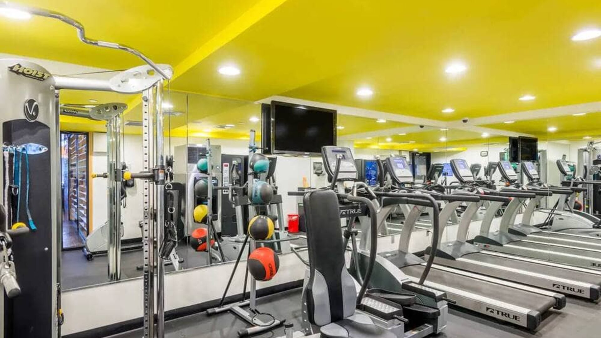 The hotel’s fitness room, furnished with a range of exercise machines.