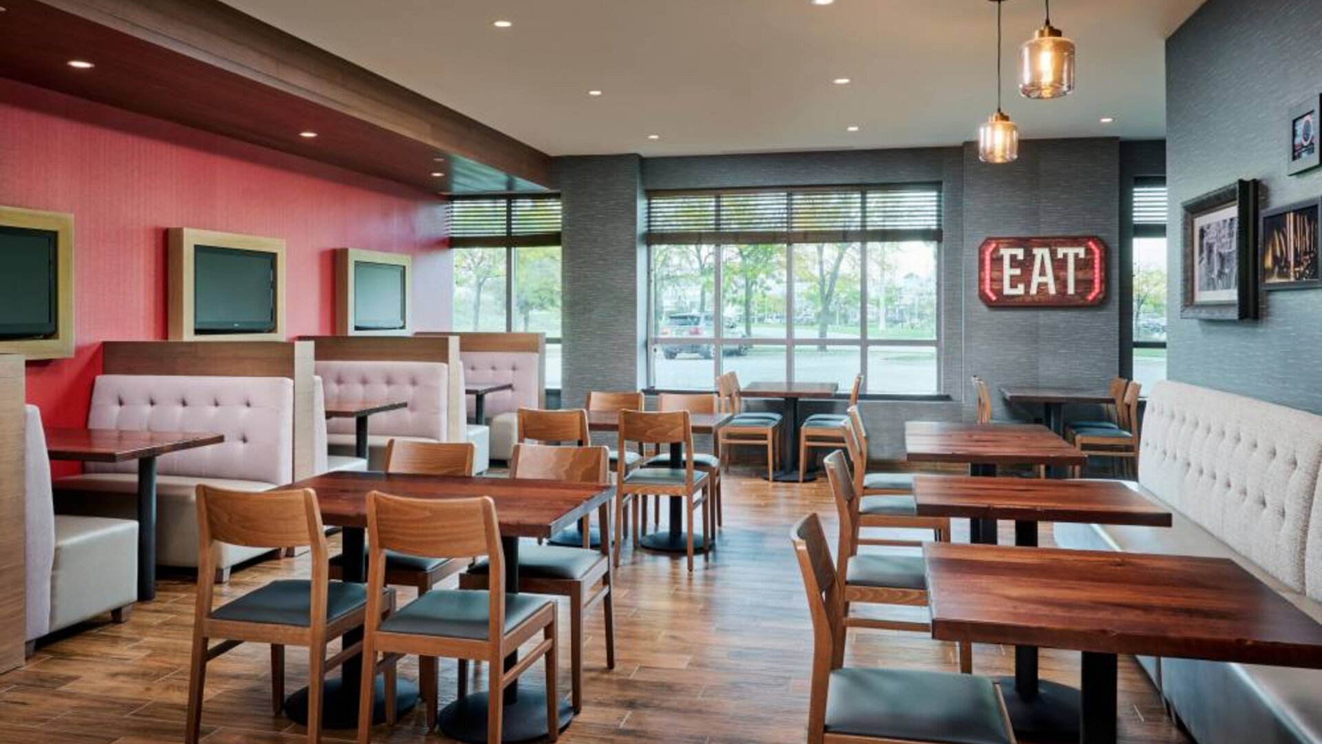 Burger Theory Restaurant and Bar is the on-site dining venue, with tables for four or two diners.