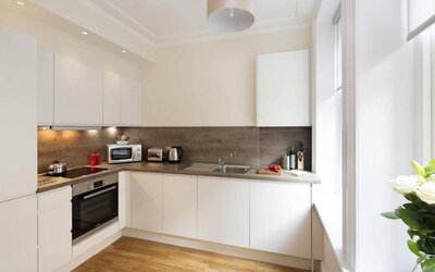 The Hammersmith One’s kitchen, including kettle, oven, microwave, and toaster.